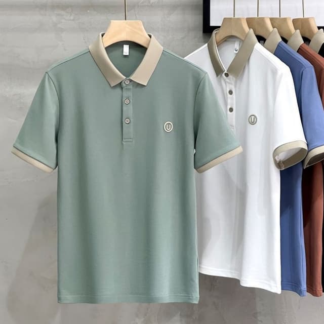 เสื้อโปโลแขนสั้นลําลอง เนื้อผ้าฝ้าย ปักลาย ทรงหลวม ระบายอากาศ สไตล์นักธุรกิจ สําหรับผู้ชาย มี 5 สี