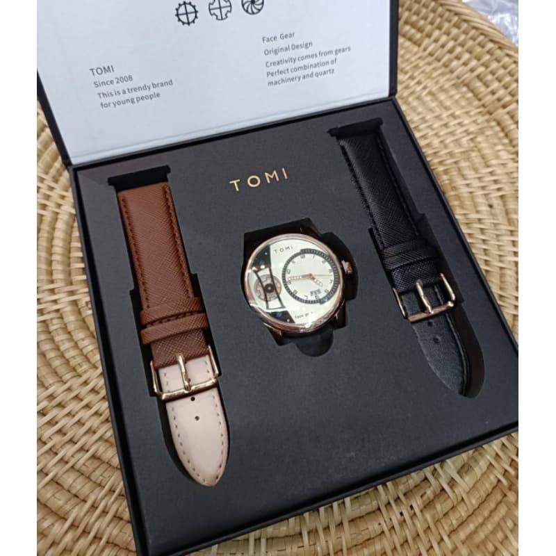 นาฬิกาแบรนด์ TOMI แบรนด์แท้ แพคเกจแม่เหล็ก พร้อมสายหนัง 2 เส้น นาฬิกาควอทซ์ นาฬิกากันน้ํา ขนาดหน้าปัด 4CM.