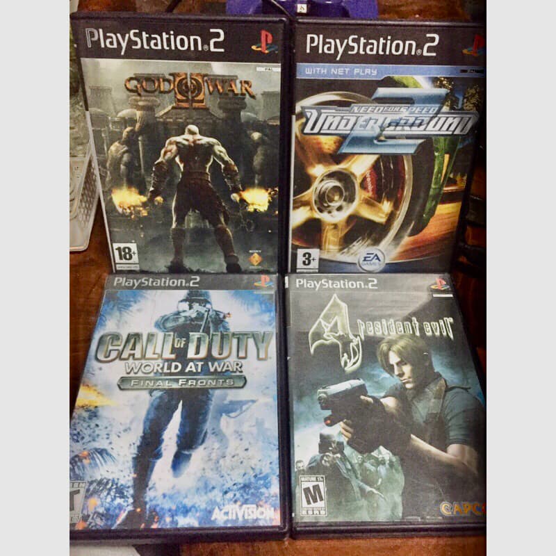 รวมแผ่นเกมส์ (ps2 ได้ 4แผ่น) call of duty + resident 4 + andergrounng + god of war