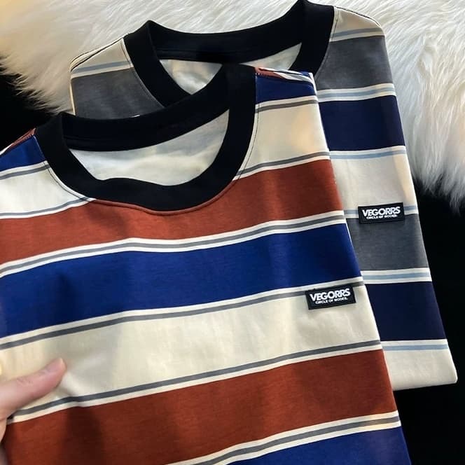 PROMAN เสื้อยืดลายริ้ว unisex เสื้อผ้าฝ้าย ทรงโอเวอร์ ผ้าระบายเหงื่อ แมทช์ทุกลุค สไตล์เกาหลี เหมาะฤดูร้อน…