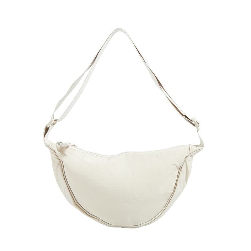 ญี่ปุ่นสีทึบแบบพกพาDumplingกระเป๋าผู้หญิง2025ใหม่Crossbodyน้ำหนักเบาไหล่ผ้าใบกระเป๋าไหล่กระเป๋ารักแ รูปที่ 1